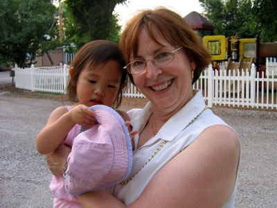 Grandma does not like holding her grandbaby, does she?